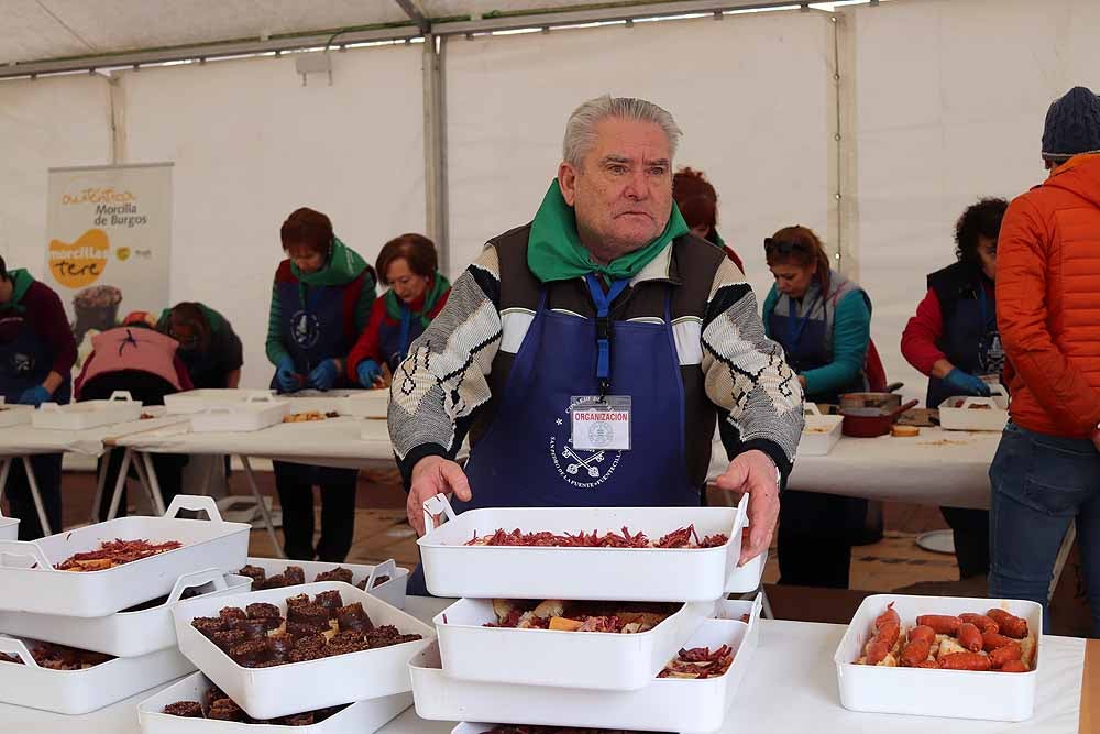 El reparto de la cecina, en imágenes