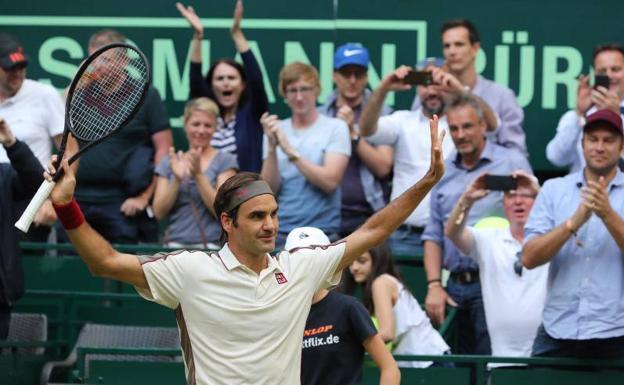 Federer vence a Bautista