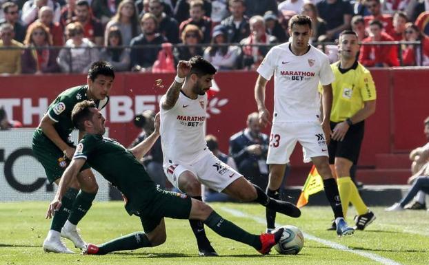 El Sevilla rescató un punto ante un Espanyol en inferioridad